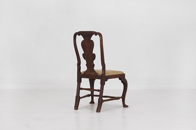 Lot 32 - A carved walnut side chair