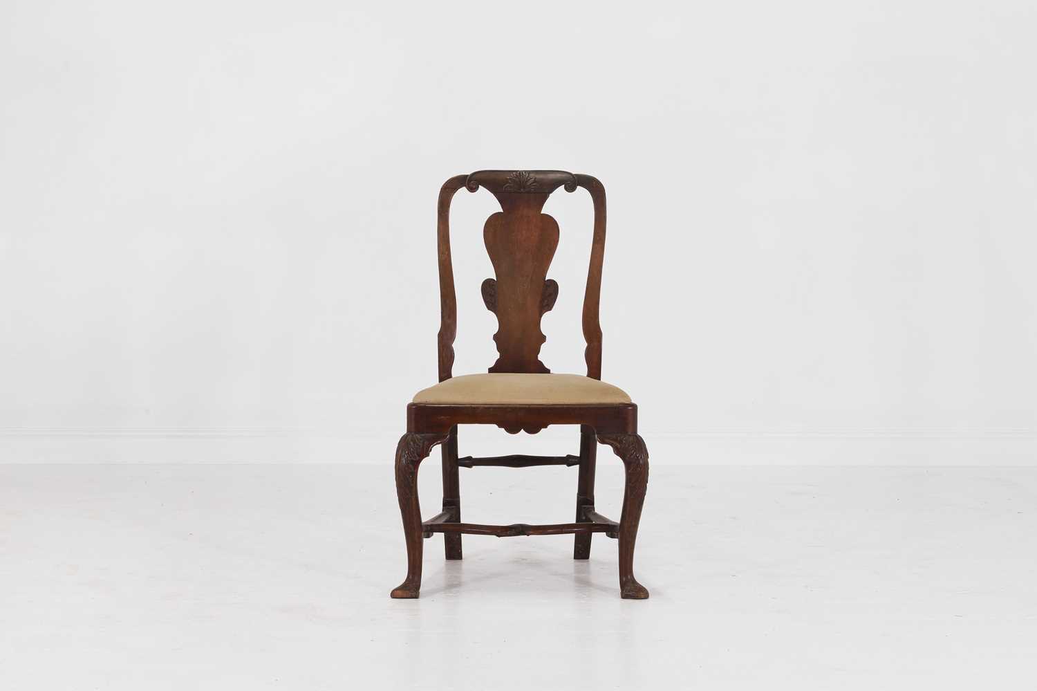 Lot 32 - A carved walnut side chair