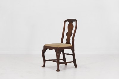Lot 32 - A carved walnut side chair