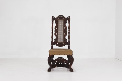 Lot 17 - A baroque-style carved walnut side chair