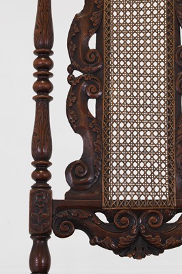 Lot 17 - A baroque-style carved walnut side chair