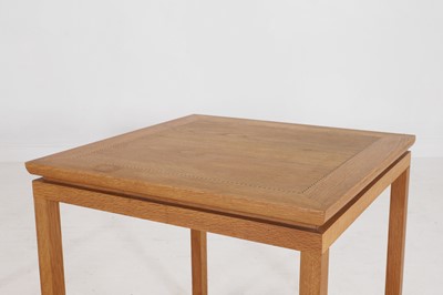 Lot 24 - A pair of golden oak side tables by Linley