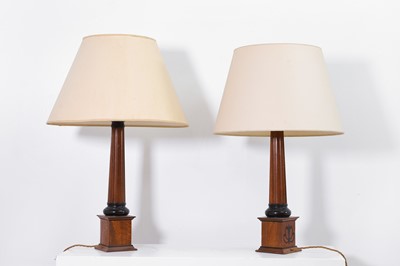 Lot 15 - A pair of mahogany table lamps by Linley
