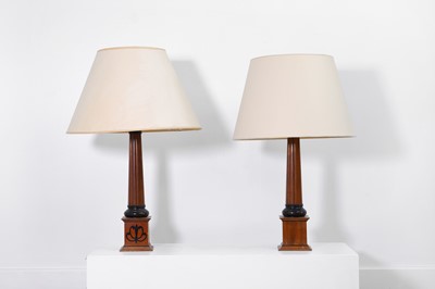 Lot 15 - A pair of mahogany table lamps by Linley