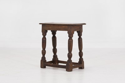 Lot 34 - An oak joint stool