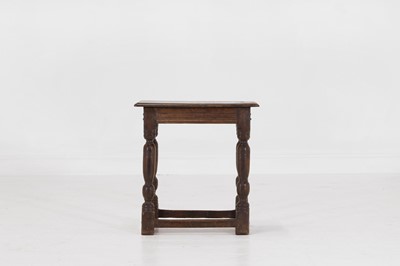 Lot 34 - An oak joint stool