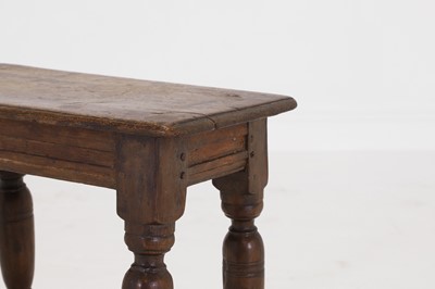 Lot 34 - An oak joint stool