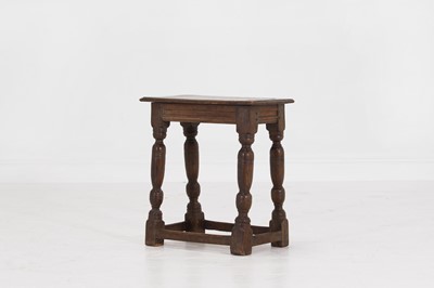 Lot 34 - An oak joint stool