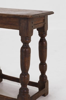 Lot 34 - An oak joint stool