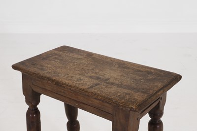 Lot 34 - An oak joint stool