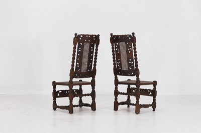 Lot 40 - A near pair of carved walnut side chairs