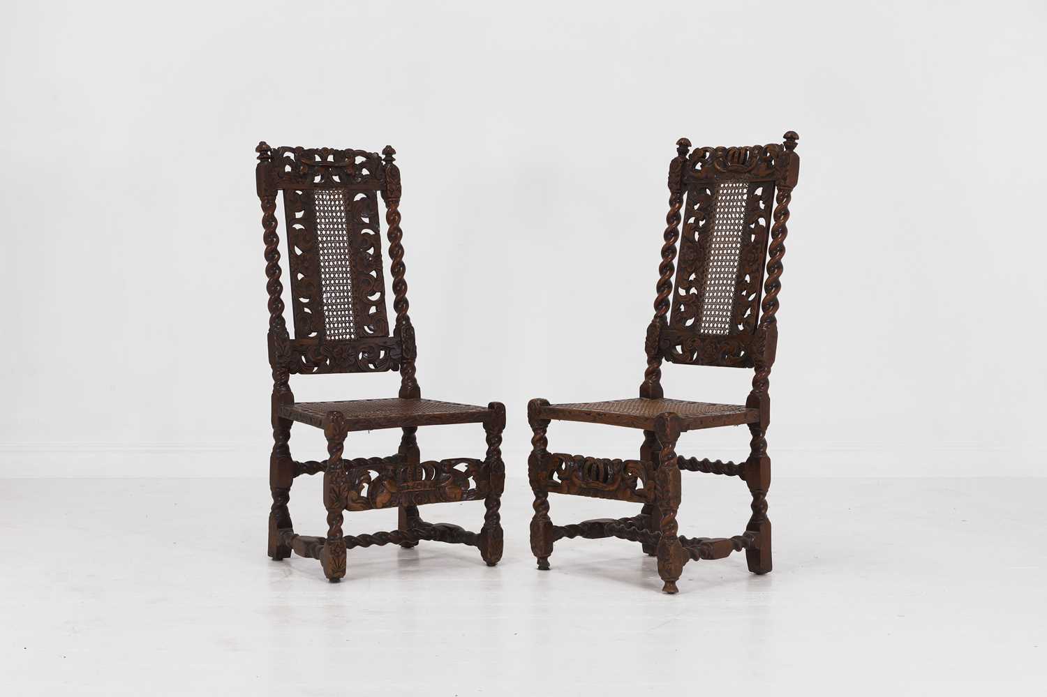 Lot 40 - A near pair of carved walnut side chairs