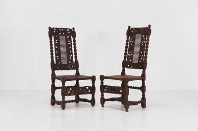 Lot 40 - A near pair of carved walnut side chairs