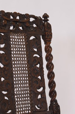 Lot 40 - A near pair of carved walnut side chairs