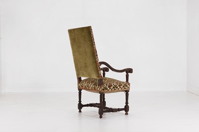 Lot 20 - A carved walnut open armchair