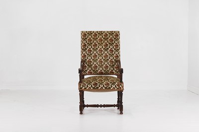 Lot 20 - A carved walnut open armchair