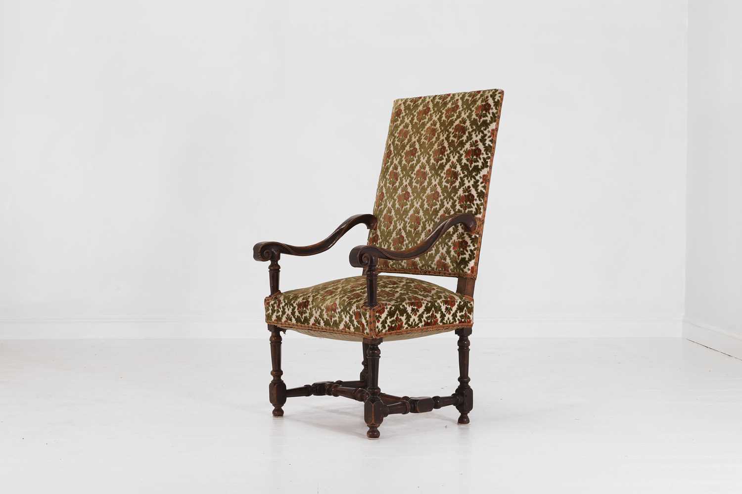 Lot 20 - A carved walnut open armchair