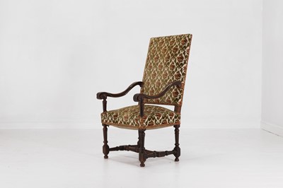 Lot 20 - A carved walnut open armchair