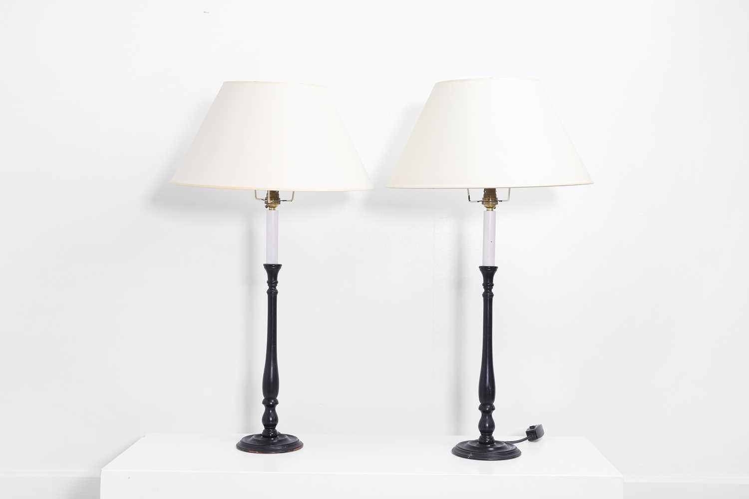 Lot 232 - A pair of painted wooden table lamps