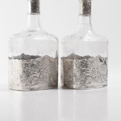 Lot 50 - A pair of silver-mounted glass decanters