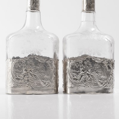 Lot 50 - A pair of silver-mounted glass decanters