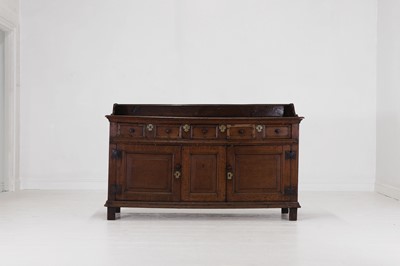 Lot 395 - A James II oak low dresser