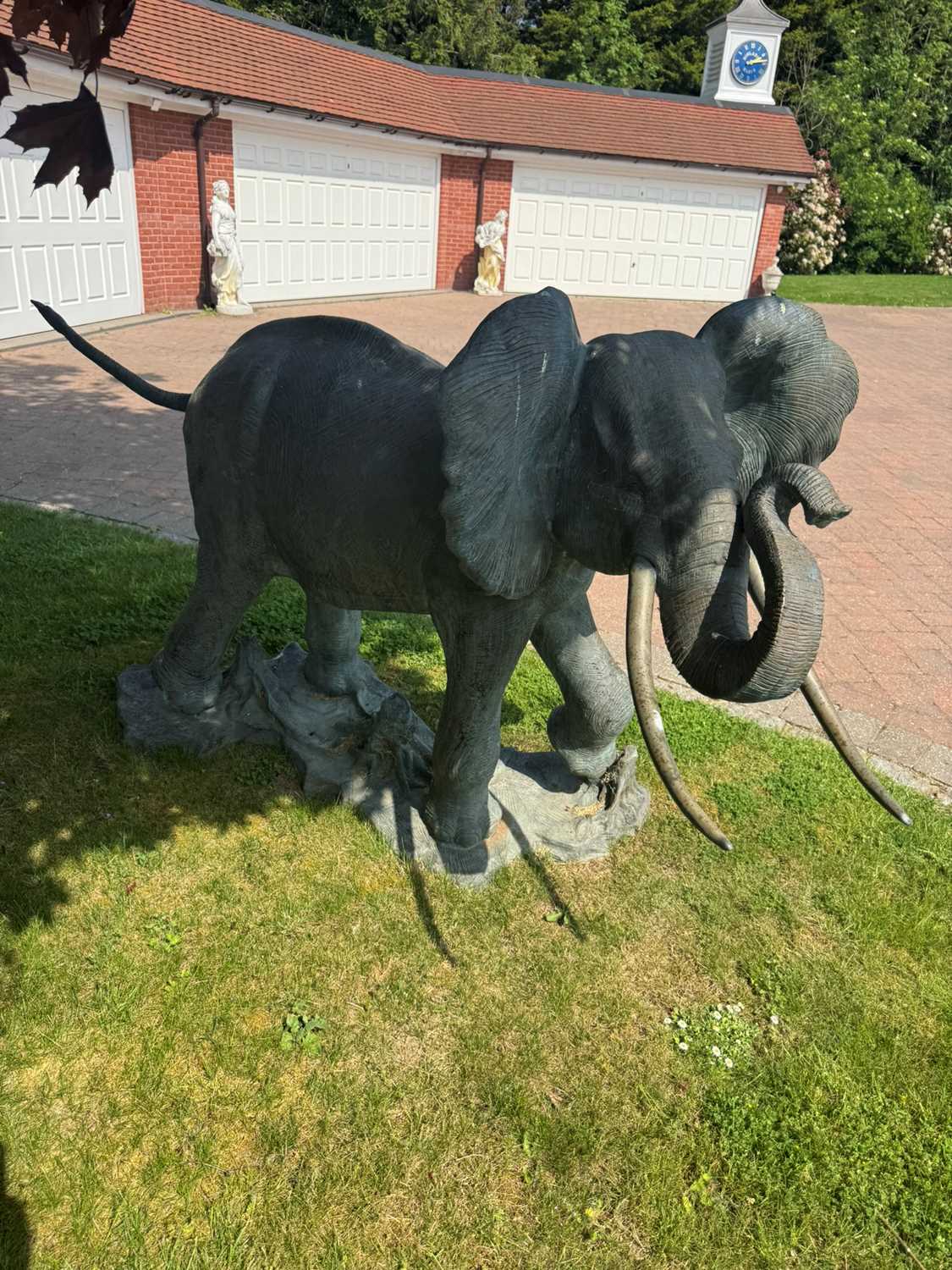 Lot 281 - A large bronze elephant