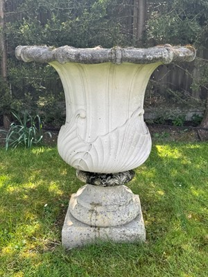Lot 523 - A pair reconstituted garden urns