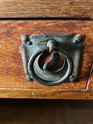Lot 344 - An Arts and Crafts dwarf open bookcase