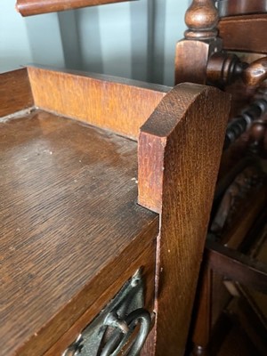 Lot 344 - An Arts and Crafts dwarf open bookcase