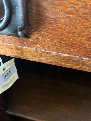 Lot 344 - An Arts and Crafts dwarf open bookcase
