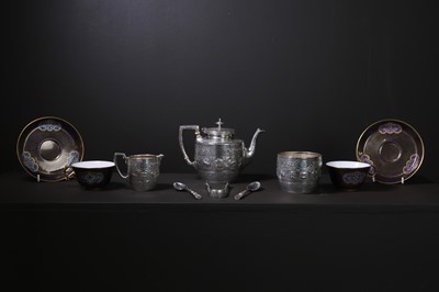 Lot 302 - ​​A Victorian silver and Sèvres porcelain tea set