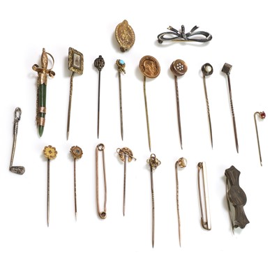 Lot 413 - A collection of stick pins and brooches