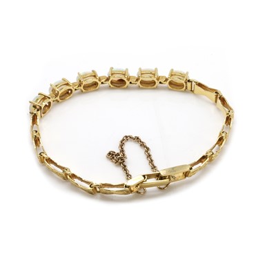Lot 221 - An opal cabochon link bracelet