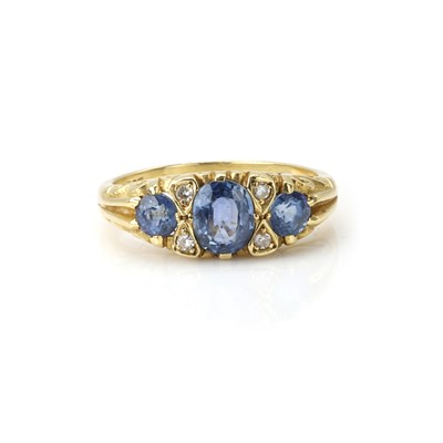 Lot 145 - An 18ct gold sapphire and diamond ring