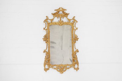 Lot 75 - A George III-style carved giltwood pier mirror