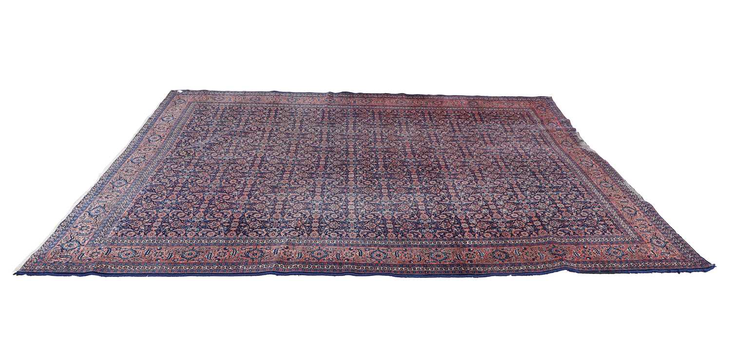 Lot 470 - A large Feraghan Persian carpet