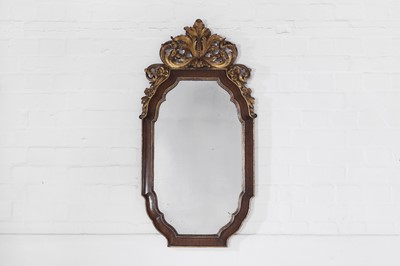 Lot 203 - A George II-style walnut and parcel-gilt pier mirror