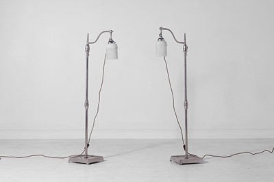 Lot 69 - A pair of chrome adjustable floor lamps