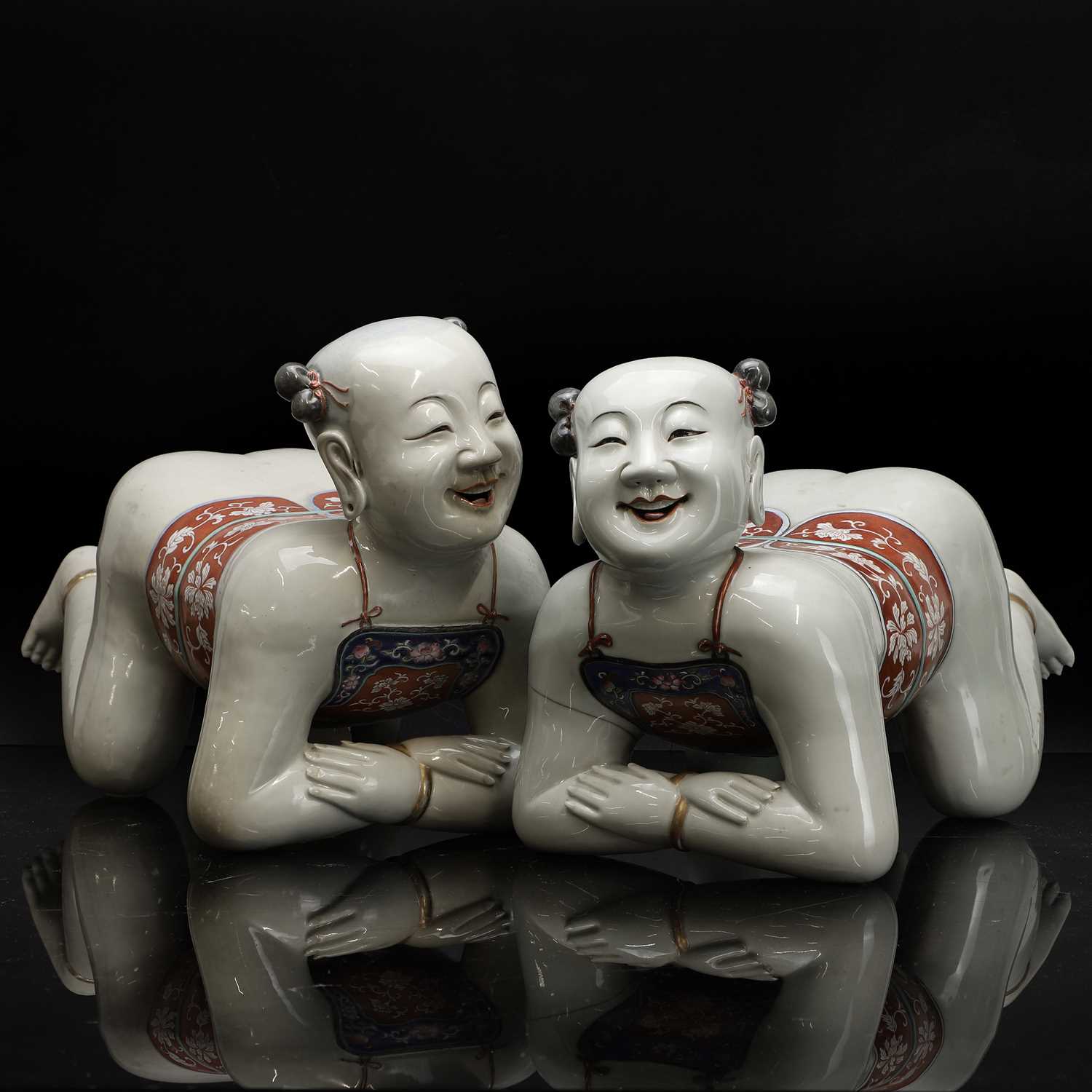 Lot An amusing pair of large Chinese famille rose pillows