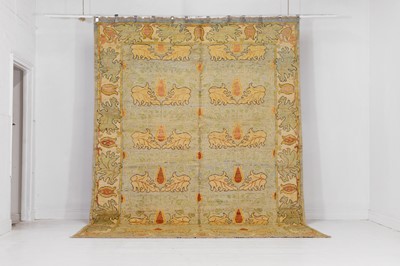 Lot 450 - A wool carpet of Arts and Crafts design