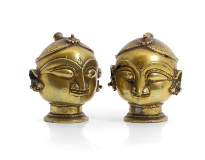 Lot 178 - A pair of Buddhist bronze heads