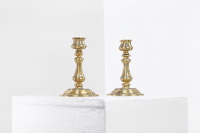 Lot 304 - A pair of gilt-bronze candlesticks