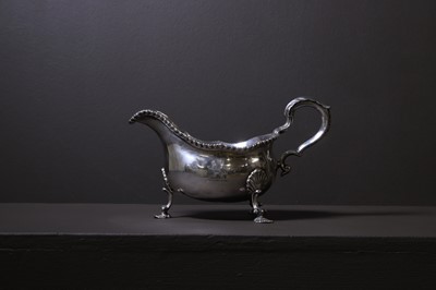 Lot 306 - A George III silver sauce boat