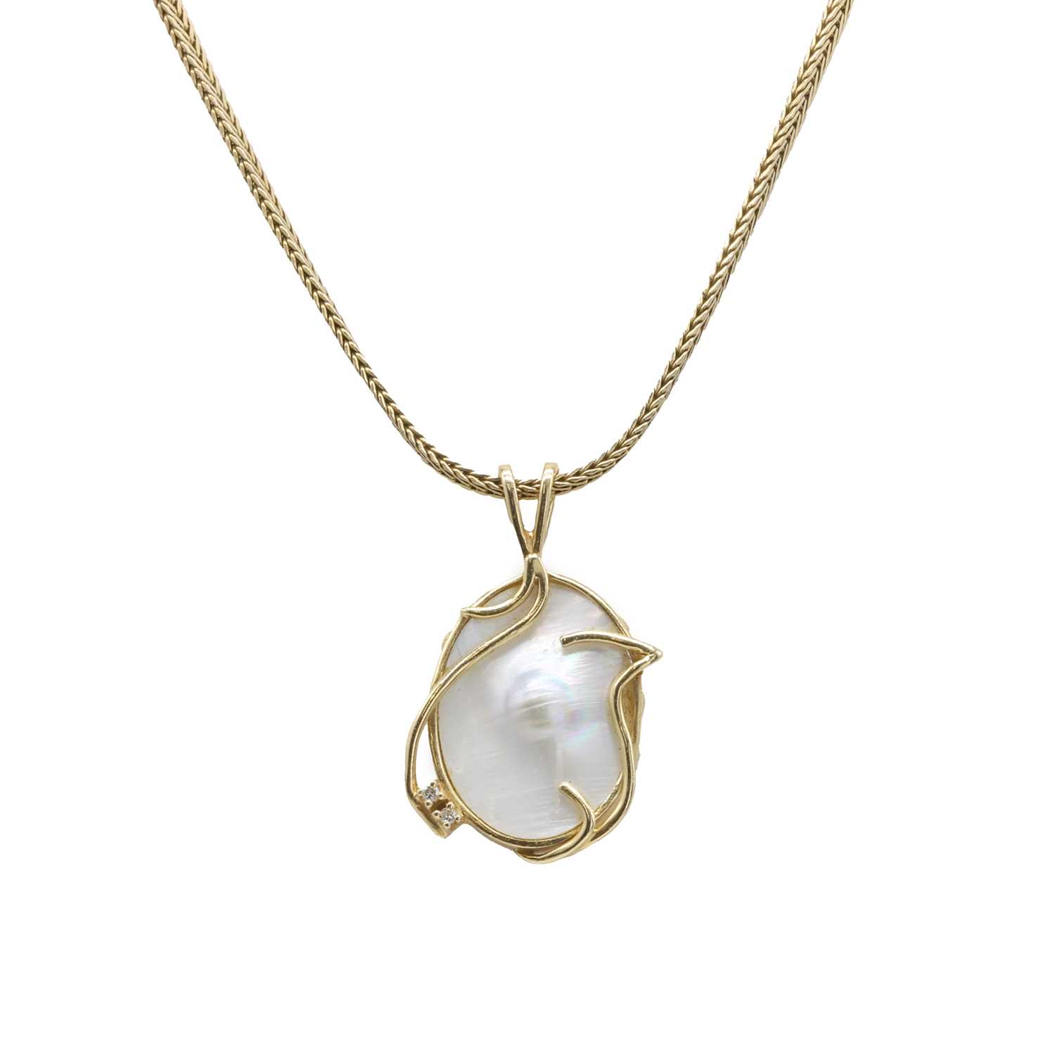 Lot 141 - A blister pearl and diamond pendant necklace