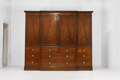 Lot 209 - A George III flame mahogany wardrobe