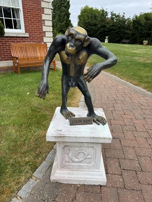 Lot 261 - Two patinated bronze and gilt chimpanzees