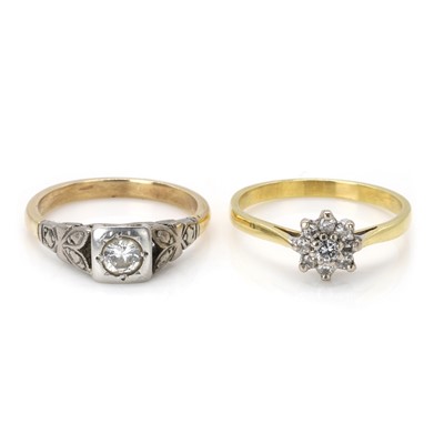 Lot 324 - An 18ct gold diamond cluster ring and a diamond single stone ring