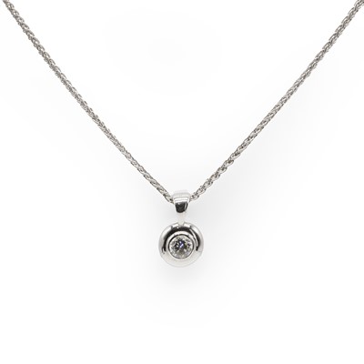 Lot 84 - An 18ct white gold diamond single stone pendant on chain