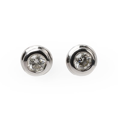 Lot 85 - A pair of white gold diamond stud earrings